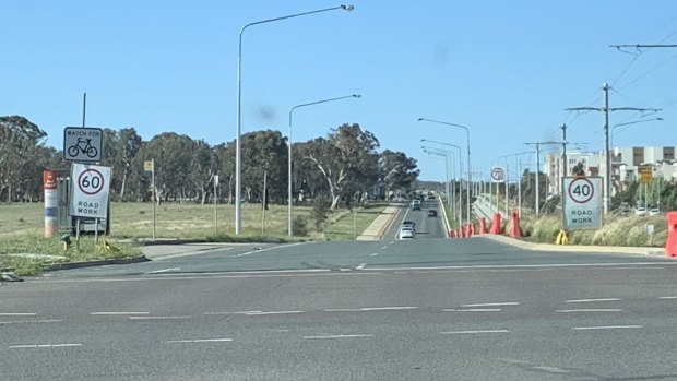 Three speed limit signs within metres of each other on Flemington Road in Canberra's north.