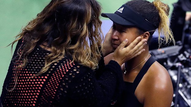 Osaka is hugged by her mum, Tamaki, after defeating Serena Williams in the 2018 US Open final.
