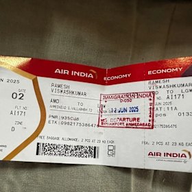 Ramesh, according to his boarding pass, was seated in the emergency exit row.