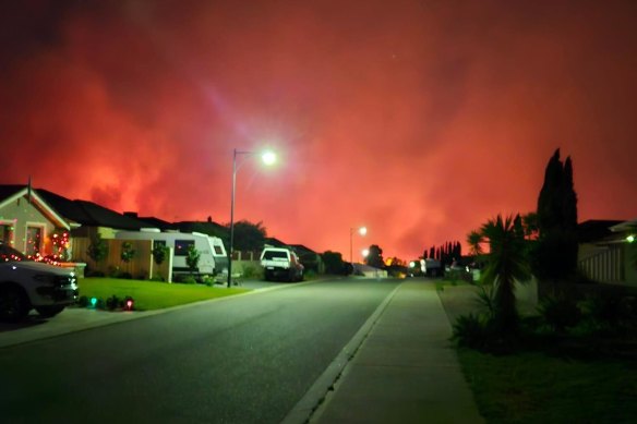 The glow from the bushfire on Wednesday night from Ashby, a northern suburb of Perth.