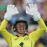 Alyssa Healy and Alana King celebrate the wicket of England’s Tammy Beaumont.