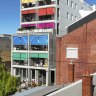 The Terrace house features bright, colourful canvas awnings.