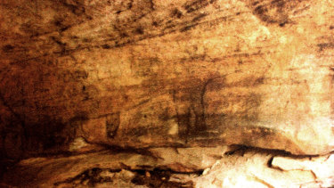 Bull Cave in the early 1980s with the outlines of a bull still visible.
