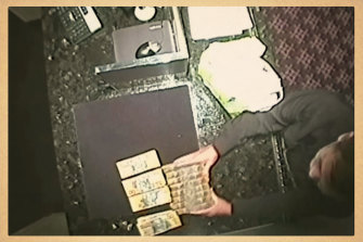 Melbourne financial adviser Roy Moo, who was prosecuted for laundering drug money through Crown casino, deposits bundles of drug money at Crown in 2012. Images come from surveillance tapes.