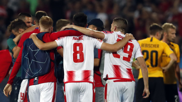 Red Star players celebrate after the second-leg match against Young Boys.
