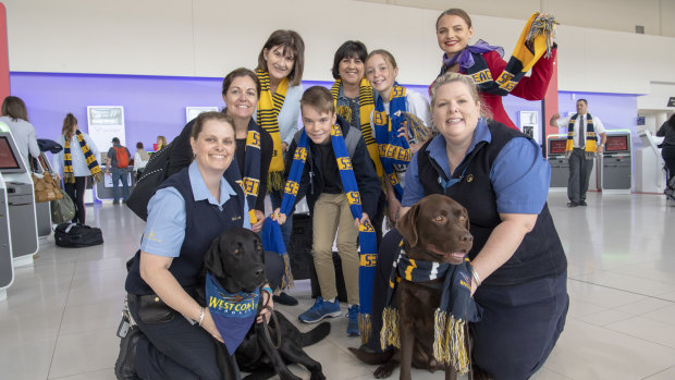 Quarantine WA detector dogs Jasper and Sam will be keeping their nose to the ground as Eagles fans return home from Melbourne.