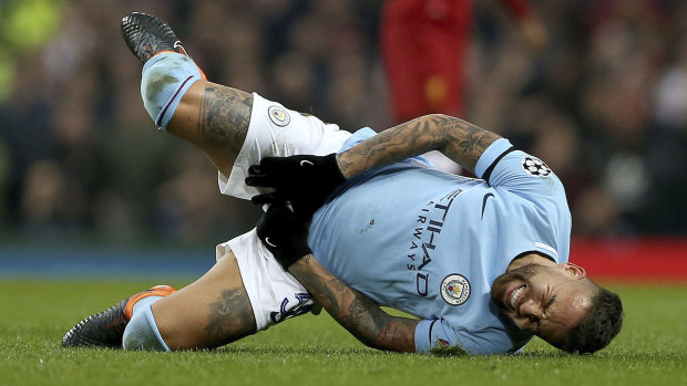 Manchester City's Nicolas Otamendi goes down from a challenge during the  Champions League, quarterfinal.