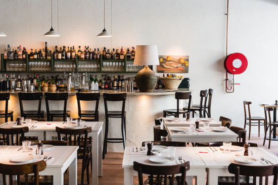Settle in until midnight at Bar Totti’s.