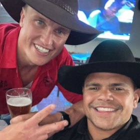 Jack Wighton and Latrell Mitchell on Saturday night.