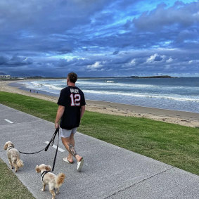 Jackson Hastings walking his dogs Bruce and Benji. 
