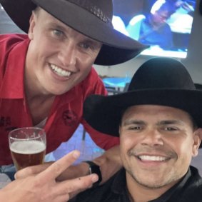 Jack Wighton and Latrell Mitchell on Saturday night.