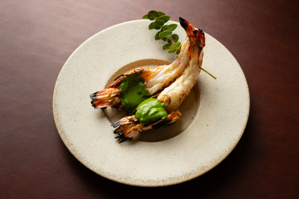 Skull Island prawns with native greens paste, strawberry gum and eucalyptus at Kiln. 
