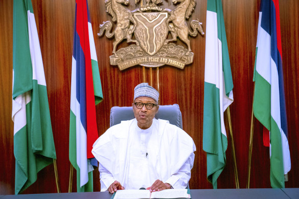 Nigeria's President Muhammadu Buhari, addresses the nation on a live broadcast, Thursday, Oct. 22, 2020. 