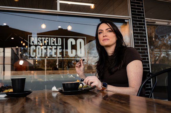Manager of the Eastfield Coffee Co, Ebony Talbot, having brekkie  in The Mall, Croydon South.