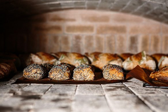 Breads are cooked in a woodfire oven. 