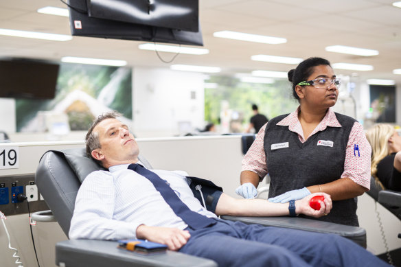 NSW Health Minister Ryan Park donates blood at the Town Hall Lifeblood Centre in Sydney’s CBD on Monday.