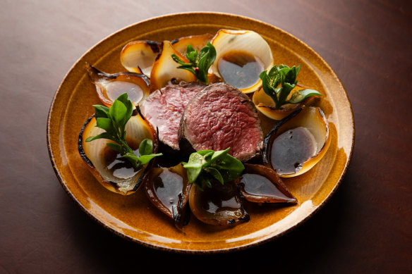 Eye fillet with onion and ice plant. 