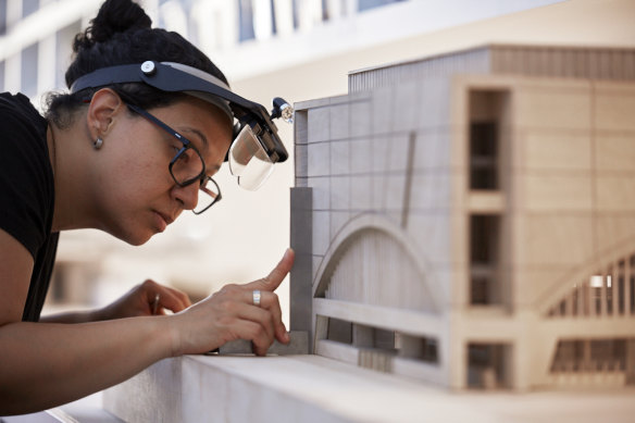 Elizabeth Torres from Smart Design Studio working on a model. 