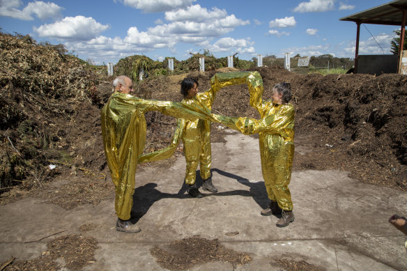 The material used in the gold suits is also known as mylar, used for emergency or space blankets.