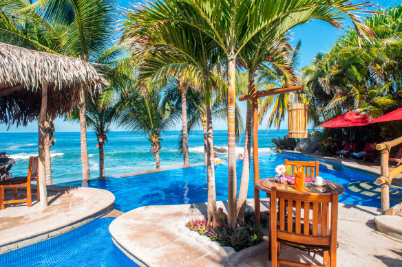 Poolside dining… Playa Escondida’s restaurant overlooks the resort infinity pool.