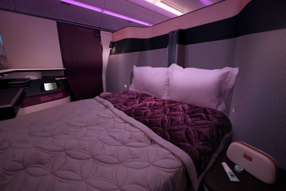 The middle-aisle QSuites can be converted into a double bed with privacy doors on either side.