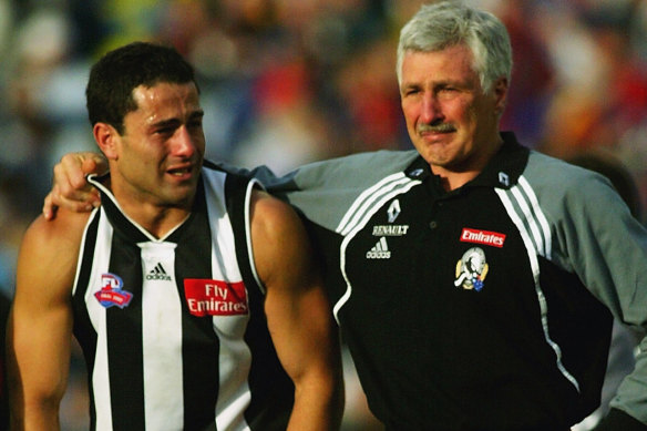 Paul Licuria and Mick Malthouse in the aftermath of the 2002 grand final, which Collingwood lost narrowly.