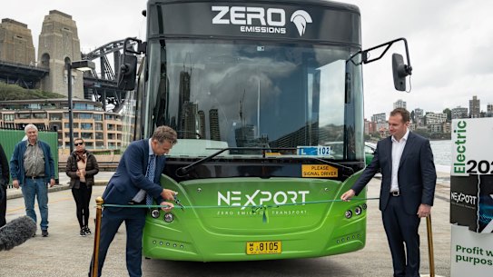 Former transport minister Andrew Constance, centre, announced several years ago an ambitious target to convert the state’s diesel bus fleet to electric vehicles within a decade.