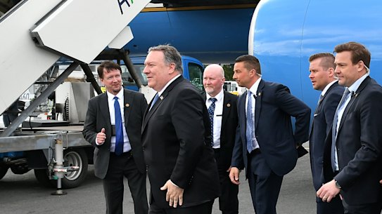 US Secretary of State Mike Pompeo, centre, poses with security officers of the Finnish police as he prepares to leave Rovaniemi, Finland, after attending the 11th Ministerial Meeting of the Arctic Council. 