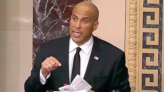Marathon speech: Senator Cory Booker, a Democrat from New Jersey, speaks on the Senate floor.