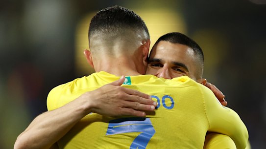 Cristiano Ronaldo of Al Nassr celebrates scoring his team’s second goal with Aziz Behich in February 2024.