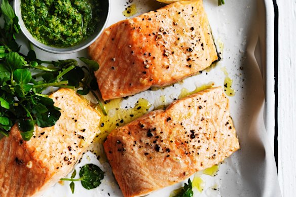 Roast salmon with macadamia and rocket pesto.