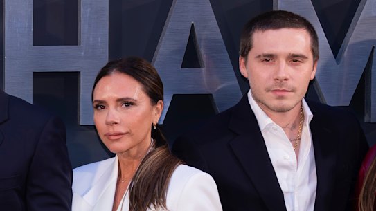David and Victoria Beckham with their children, from left: Romeo, Cruz, Harper, Brooklyn and his wife Nicola Peltz Beckham in London in 2023.