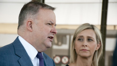 Opposition infrastructure spokesman Anthony Albanese, flanked by Susan Lamb, the Labor candidate for Longman, on Thursday.