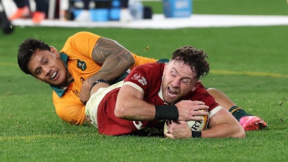 Ireland’s Hugo Keenan scores the winning try for the British and Irish Lions against Australia at the MCG.