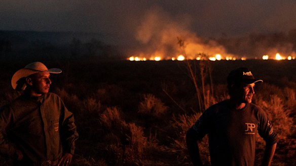 The battle against fire in the state of Mato Grosso, Brazil, on Friday. Under increasing international pressure to contain the fires sweeping parts of the Amazon, President Jair Bolsonaro authorised the military to battle the massive blazes. 