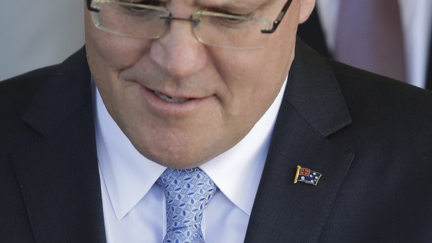 Prime Minister Scott Morrison gave all of his ministers an Australian flag lapel pin.