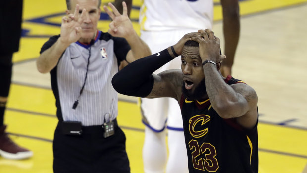 Oh no ... LeBron James reacts to a call late in regulation.