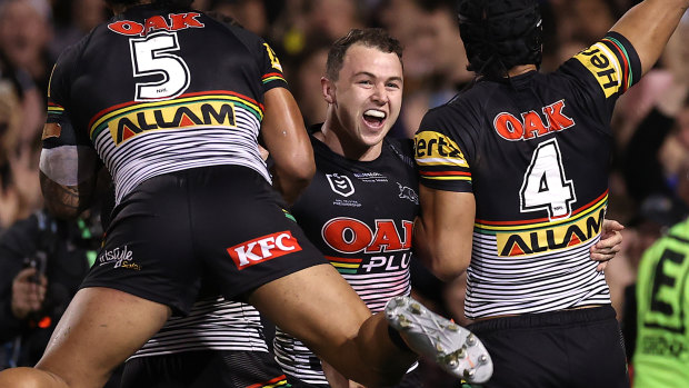 Dylan Edwards celebrates with Panthers teammates.