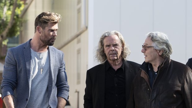 George Miller, right, with Chris Hemsworth and producer Doug Mitchell at the Furiosa announcement at Fox Studios this week. 