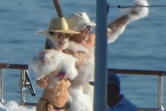 Lauren Sanchez and Jeff Bezos enjoying the foam party on the Koru, their $US500 million megayacht. 