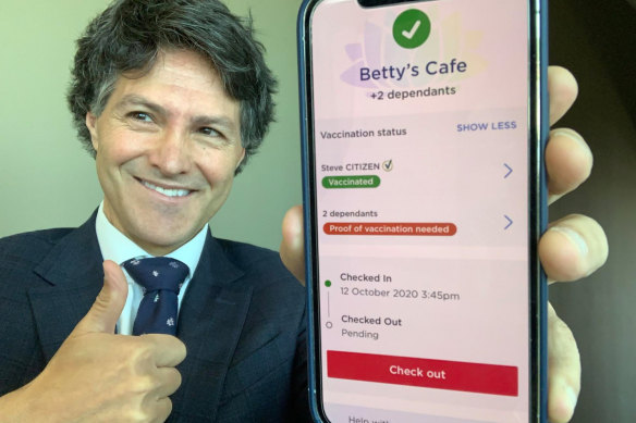NSW customer service minister Victor Dominello showing off the proposed proof of vaccination feature in the Service NSW app.