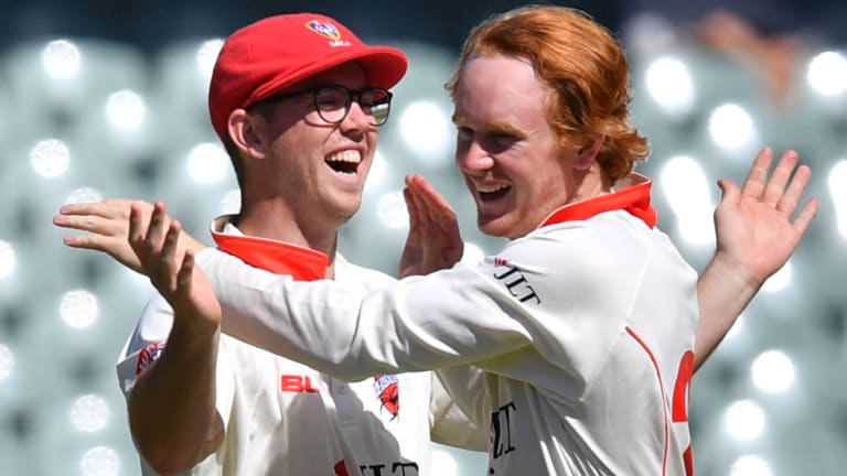 Lloyd Pope is congratulated.