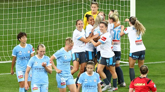 Sydney FC celebrate going 2-0 up after a Natalie Tobin goal against Melbourne City at AAMI Park on Thursday night.