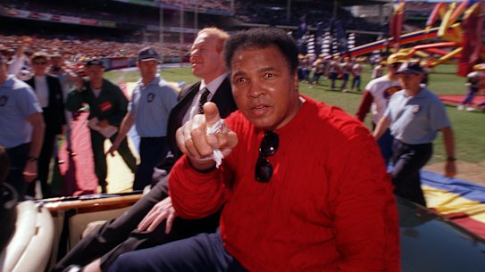 The greatest: Muhammad Ali completed a lap of honour on grand final day at the MCG in 1998.