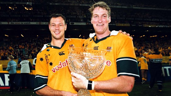 Glory days: Justin Harrison, right, with Matt Cockbain, celebrates a momentous win on debut for Australia. 