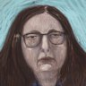 Patterson’s long brunette hair cascades down over her shoulders.