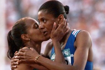 Cathy Freeman (left) and Marie-Jose Perec after Perec's gold medal in the 400m at the 1996 Olympics.