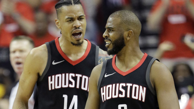 All square: Houston Rockets guard Chris Paul, right, celebrates with teammate Gerald Green.