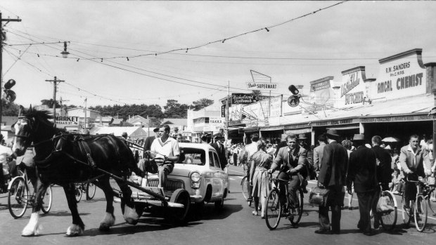 Locals act as extras in a crowd scene filmed at Station Street, Frankston.