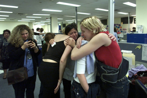 Distraught Ansett staff pack their belongings at the Ansett Oxford Square offices on September 14, 2001